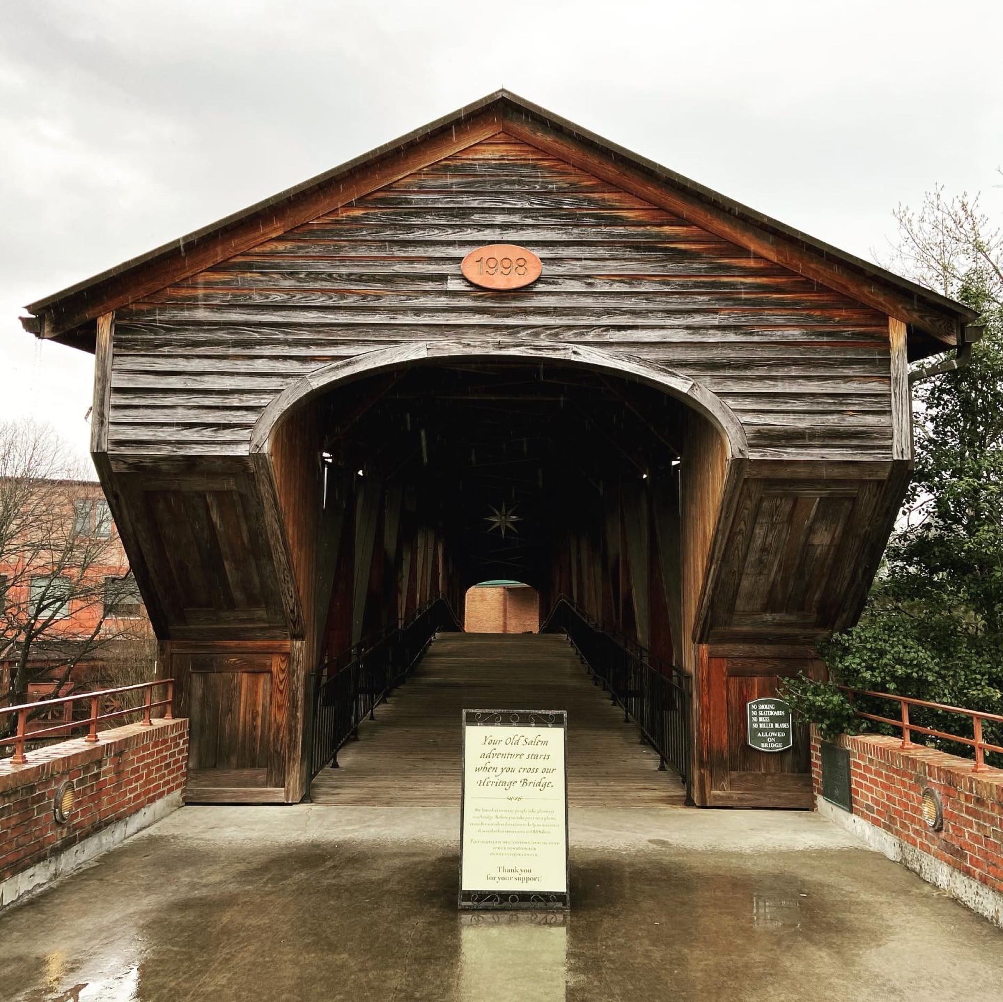 Old wooden bridge across the highway.
