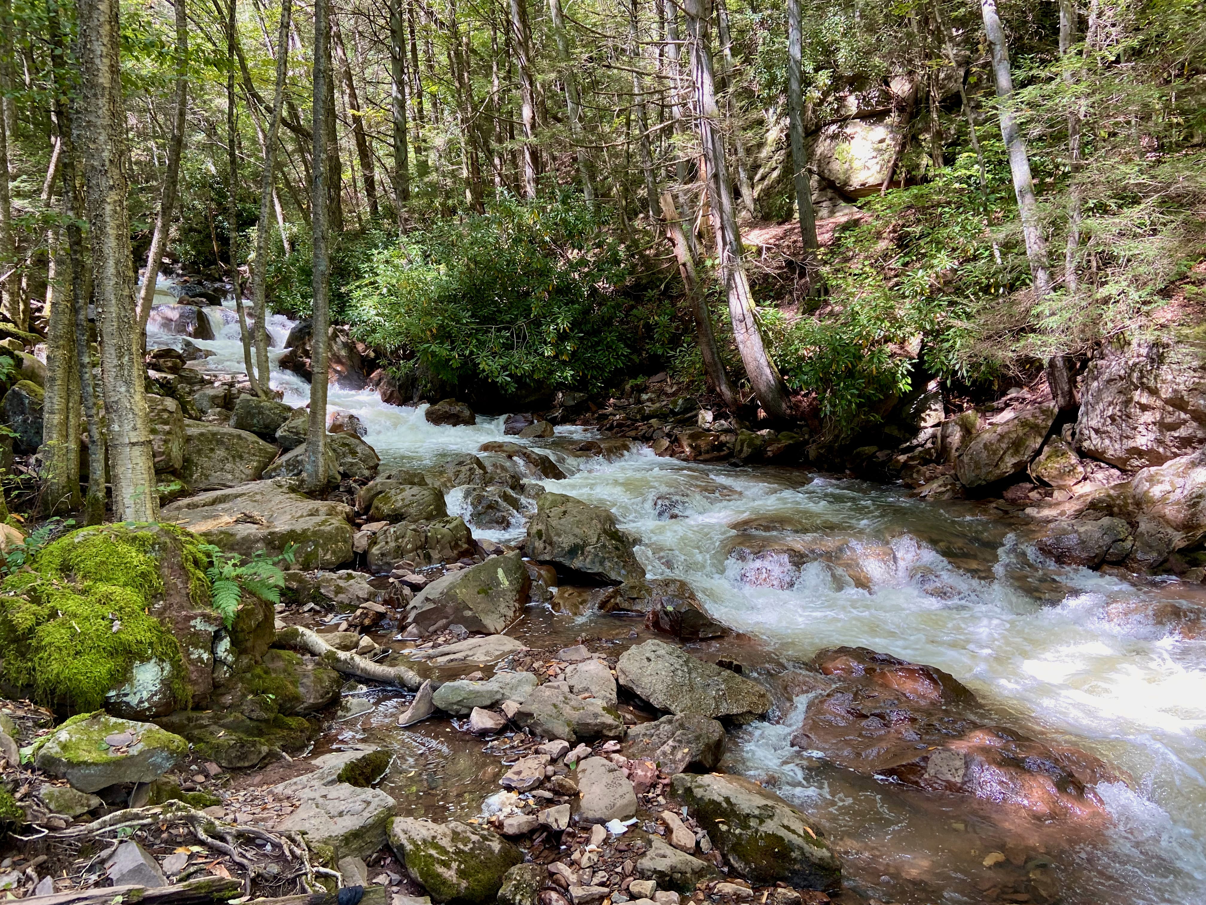 Piping water underneath the trail surface