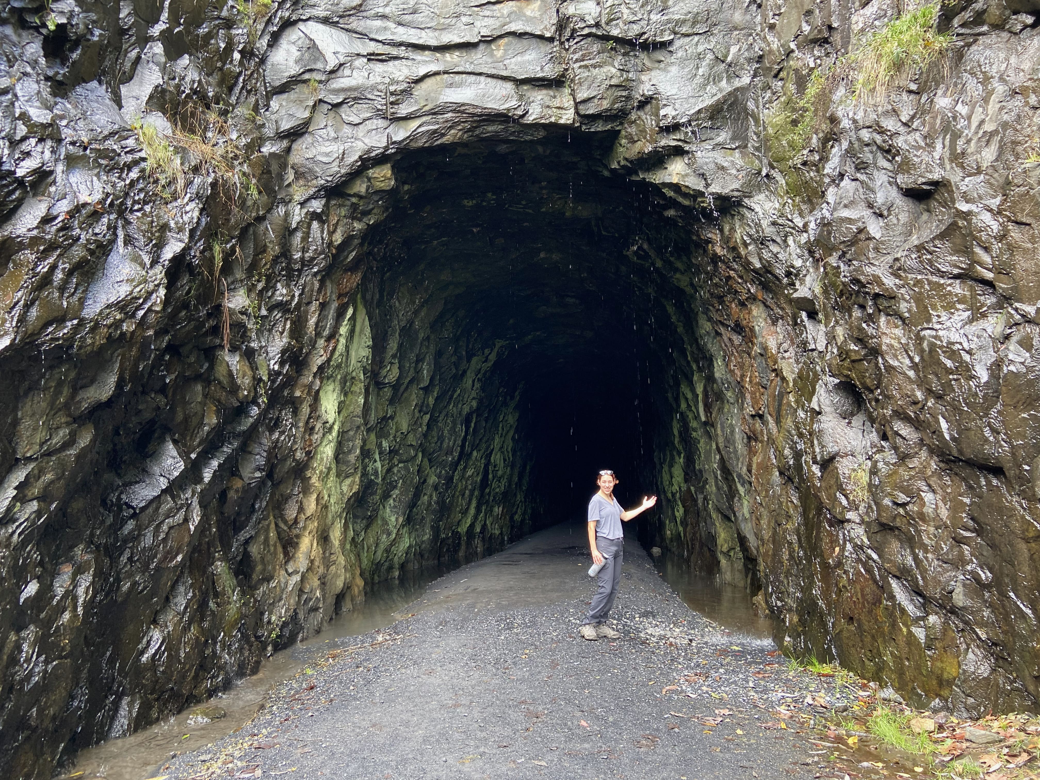 Kristin finds the water running off the mountain above.