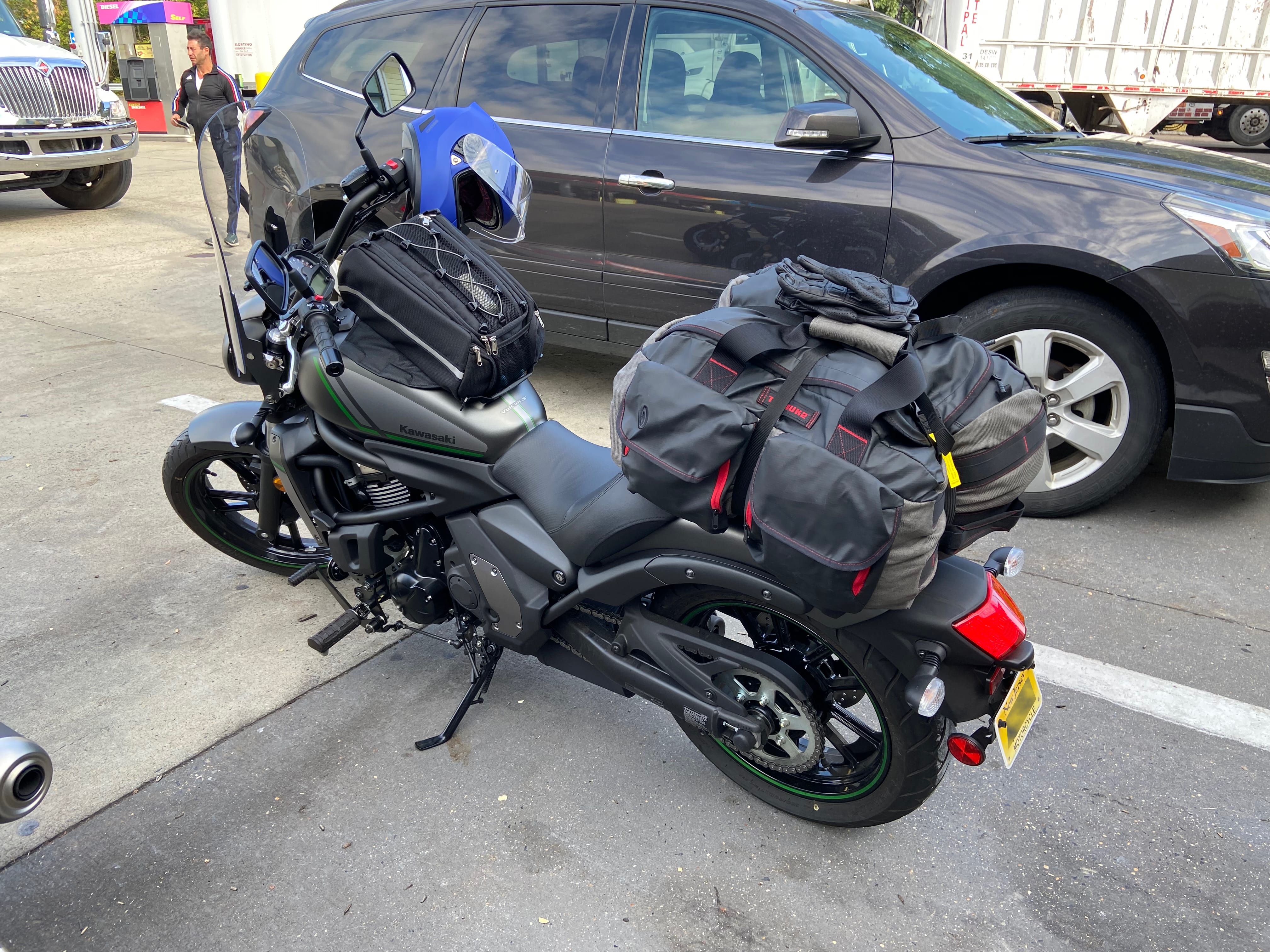 Tank bag up front, big duffel bag on the back.