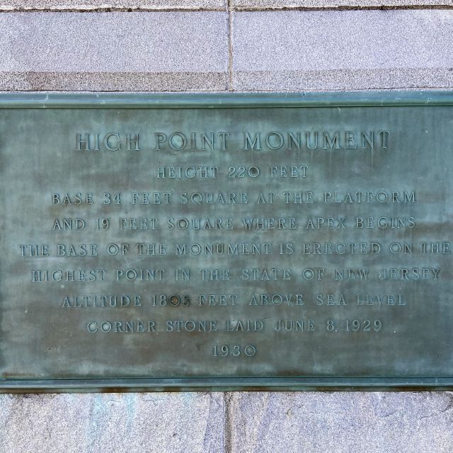High Point Monument plaque: 220 feet tall, on the highest point in New Jersey at 1,803 feet above sea level.