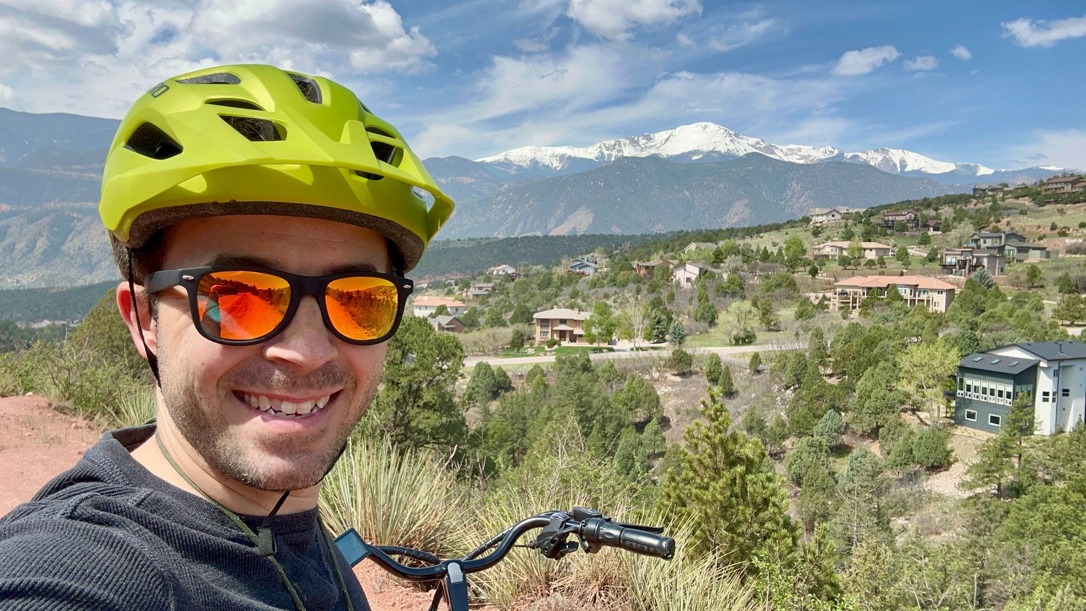 On a rented e-Bike in Garden of the Gods, looking over to Pike's Peak.